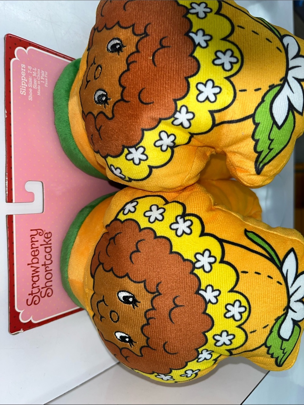 Yellow Floral Plush Slippers for Kids
Woman’s